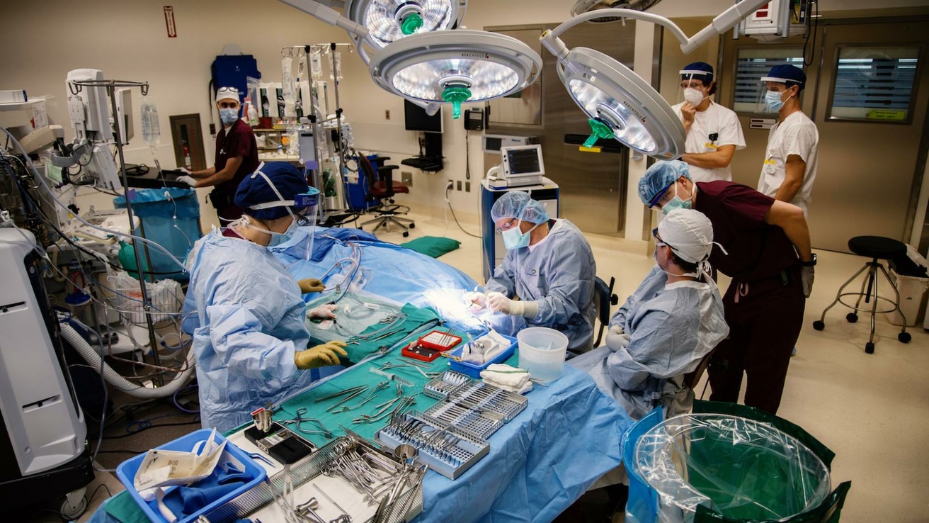 Otolaryngologist Bruce Gantz, MD, performs a robot-assisted cochlear implant procedure with the iotaMotion technology.